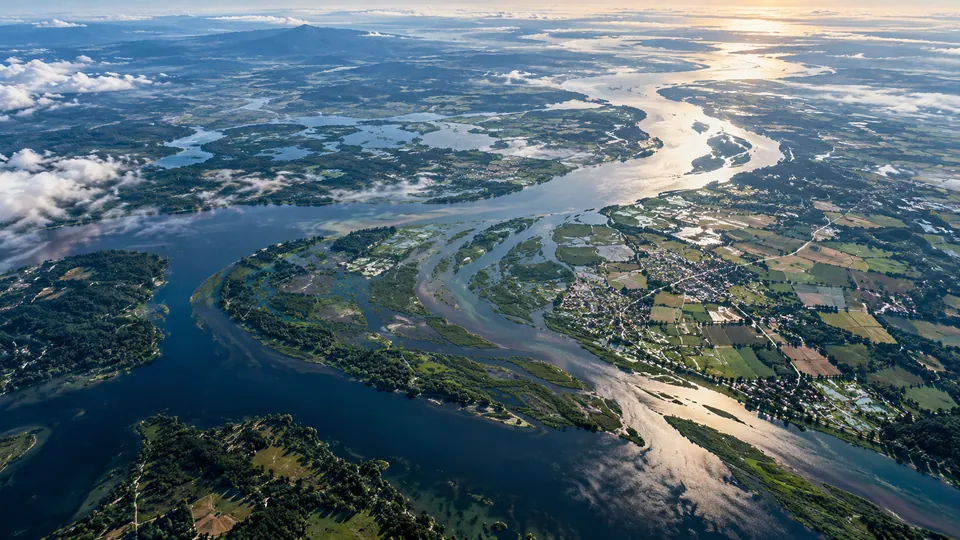 Editorial Earth-observation illustration of a river, floodplain, agricultural fields and settlements.